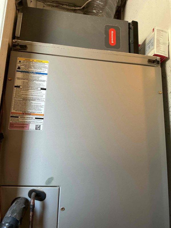 Completed first prepaid cooling maintenance visit on residential split system. Performed comprehensive inspection of outdoor condenser unit housed in wooden shelter structure and indoor air handler with Honeywell controls. Verified proper operation of both components, checked refrigerant levels, inspected electrical connections, and cleaned condenser coils. System operating within normal parameters with no issues identified.