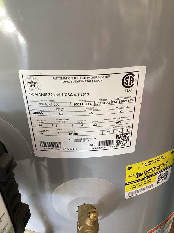 Responded to service call for gas water heater with automatic electric ignition displaying 7 flashes error code. Inspected GPVL-40 200 model 40-gallon power vent water heater previously installed in utility area. Diagnosed ignition system fault, verified gas supply and electrical connections, cleared error code, and tested unit operation to ensure proper functionality. Documented equipment condition with photos showing water heater, associated plumbing connections, copper piping, and yellow gas line installations.