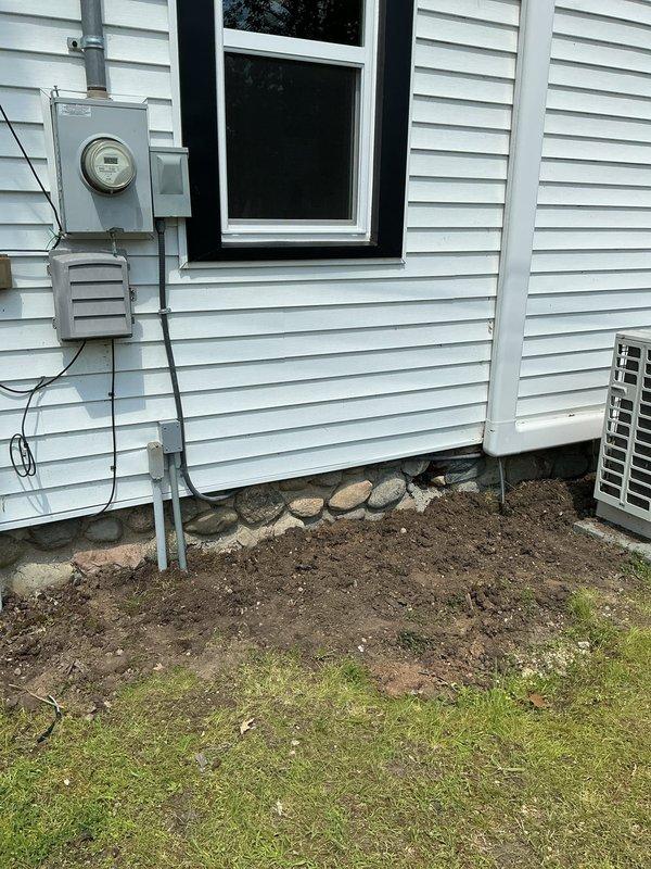 Installed dedicated 240V outlet at residential exterior for new water heater installation, running appropriate gauge wiring from main panel with proper conduit protection and weatherproof enclosure. Extended electrical service to detached storage shed, installing interior switch, receptacle outlet, and exterior flood light fixture. All work completed to code specifications with proper grounding and circuit protection.