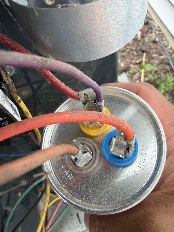 Responded to service call for leak search on HVAC system. Upon arrival, performed comprehensive system inspection and identified failed capacitor with compromised terminals and corroded electrical connections at contactor assembly. Replaced defective dual-run capacitor, cleaned and tightened all electrical connections at contactor, and verified proper voltage and amperage readings. System tested and confirmed operating within manufacturer specifications with no refrigerant leaks detected.