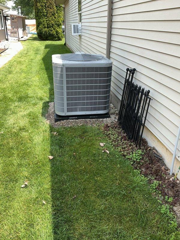 Completed full HVAC system replacement including installation of Carrier 26TPA836W003 Performance Series two-stage air conditioner, Carrier CVAVA4221XMA evaporator coil, and Carrier 58TP0B110V21-22 80% AFUE Performance Series gas furnace with two-stage gas valve and variable-speed ECM blower motor. Installed Honeywell ELITEPRO S1200 thermostat for system control. Configured horizontal attic installation with safety auxiliary drain pan and wet switch for condensate overflow protection. Mounted outdoor condensing unit on concrete pad against exterior wall with proper clearances. Installed new electrical disconnect and whip for outdoor unit. Reconnected existing supply and return ductwork to new air handler. Removed and properly disposed of old HVAC equipment. Protected work areas with floor savers and performed complete cleanup of installation area. Verified all electrical connections, refrigerant charge, gas line connections, and condensate drainage. Tested system operation through mult
