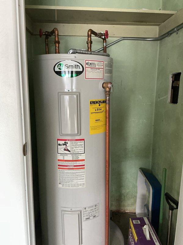 Completed first prepaid cooling maintenance visit on residential HVAC system. Performed comprehensive system inspection, verified proper operation of cooling equipment, and documented mechanical room conditions including water heater installation and electrical transfer switch panel. All components found operating within normal parameters with no immediate service needs identified.