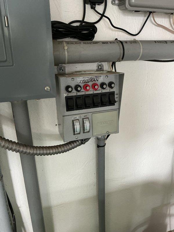 Completed first prepaid cooling maintenance visit on residential HVAC system. Performed comprehensive system inspection, verified proper operation of cooling equipment, and documented mechanical room conditions including water heater installation and electrical transfer switch panel. All components found operating within normal parameters with no immediate service needs identified.