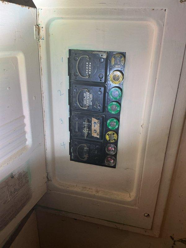 Conducted on-site evaluation for complete HVAC system replacement at residential property. Assessed existing 30-year-old furnace and air conditioning unit that has been non-operational for six years. Documented current electrical infrastructure including aged fuse panel with screw-in type fuses and exterior meter configuration. Photographed existing utility connections, conduit routing, and wall-mounted electrical components to determine compatibility requirements for new equipment installation. Evaluated structural considerations including exterior siding condition, available mounting locations, and existing service panel capacity to support modern HVAC system specifications. Provided comprehensive replacement estimate for new furnace and AC unit installation.
