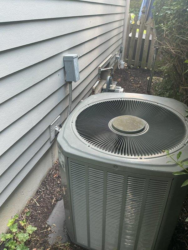 Completed diagnostic evaluation of existing HVAC system including basement-installed furnace and outdoor condensing unit. Documented current equipment condition and configuration, photographed indoor furnace installation with refrigerant lines and ductwork, and exterior AC unit with electrical connections. Scheduled estimate appointment for complete system replacement to address identified equipment failure.