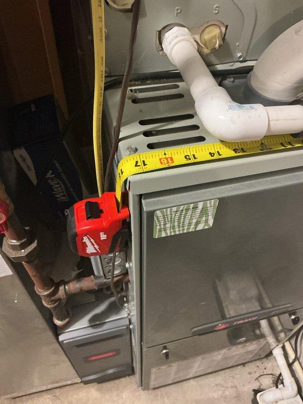 Responded to diagnostic service call for HVAC system evaluation. Conducted comprehensive assessment of existing Trane furnace and air handler system located in basement utility area. Documented current equipment specifications, measurements, and overall system condition through detailed photography for replacement estimate preparation. Coordinated scheduling for sales consultation to provide customer with equipment replacement options and pricing.