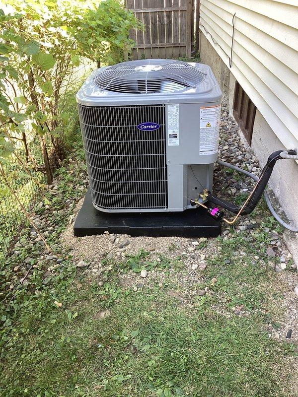 Successfully completed installation of Carrier 26SCA430N003 Comfort Series single-stage air conditioner and Carrier CVAVA3617XMA evaporator coil as a half-system replacement. Removed and recycled existing equipment, then installed new outdoor condenser unit on a 2-inch PVC pad with pea gravel base. Reconnected unit to existing line set after performing flush and pressure test to ensure system integrity. Installed new electrical disconnect and whip for proper power supply. Reconnected all existing supply and return ductwork to the new evaporator coil. Performed system startup and verified proper refrigerant charge using R454B refrigerant, with diagnostic readings showing 295.1 psig high-side pressure, 10.0°F subcooling, 98.6°F liquid saturation temperature, and appropriate superheat values. Registered manufacturer warranty coverage for both the air conditioner and evaporator coil per warranty requirements. Conducted thorough system operation explanation with homeowner and completed post