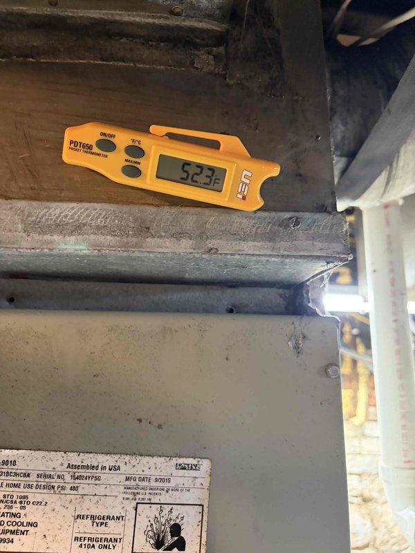 Completed annual air conditioning maintenance on residential cooling system. Performed comprehensive inspection of outdoor condenser unit and indoor air handler, recording temperature differentials and system performance metrics. Verified refrigerant type R-410A per manufacturer specifications, checked electrical connections, measured supply and return air temperatures showing proper system operation at 52.3°F and 22.9°F respectively, and confirmed unit is functioning within normal operating parameters. Discussed scheduling upcoming heating system maintenance visit with property owner.