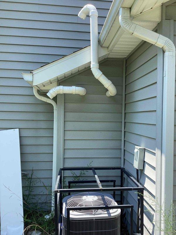 Responded to service call for tankless water heater reported as non-operational. Upon arrival, performed diagnostic evaluation of the unit and exhaust venting system. Inspected the exterior-mounted PVC exhaust/intake piping configuration for proper installation, clearances, and potential blockages. Verified venting termination points were properly positioned and free from obstructions. Assessed unit functionality and determined cause of operational failure. Completed necessary repairs to restore hot water service. Confirmed proper combustion air supply and exhaust discharge. Tested unit through complete heating cycle to verify restoration of normal operation. System returned to full working condition with proper venting and safe operation confirmed.