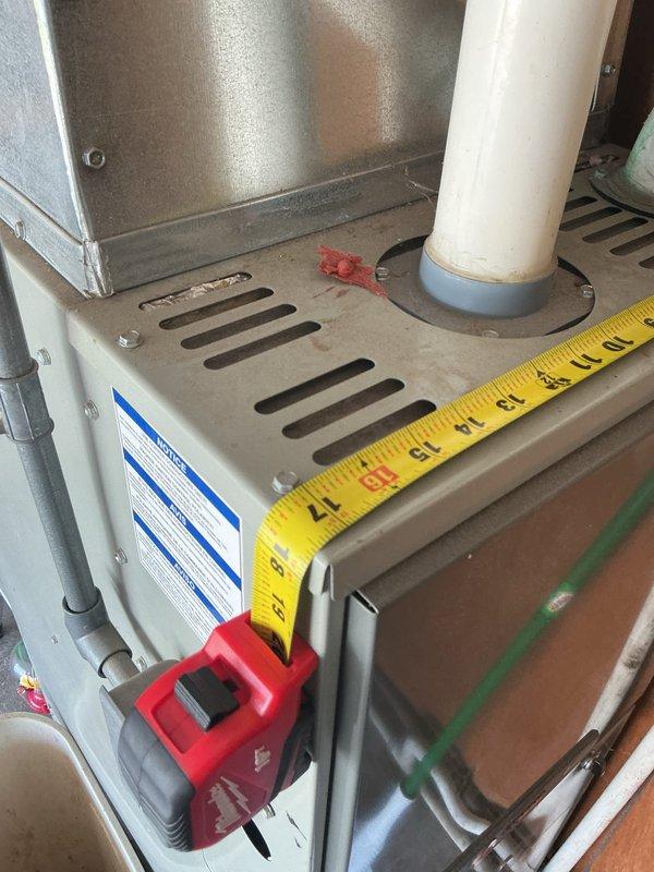 Responded to no cooling complaint on residential HVAC system. Inspected wall-mounted Honeywell thermostat and evaluated existing furnace unit for replacement estimate. Documented equipment specifications and measurements of current system, including ductwork connections and existing infrastructure to provide accurate replacement recommendations.