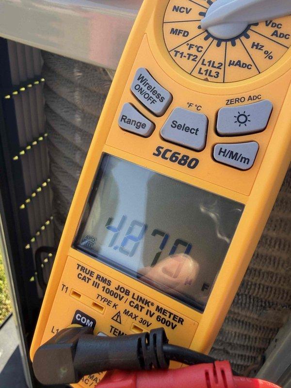 Completed comprehensive air conditioning tune-up on residential HVAC system. Performed electrical diagnostics using digital multimeter to verify proper voltage and capacitance readings at the air handler unit. Inspected and tested run capacitor connections, confirming all wire terminals were secure and electrical components were functioning within manufacturer specifications.