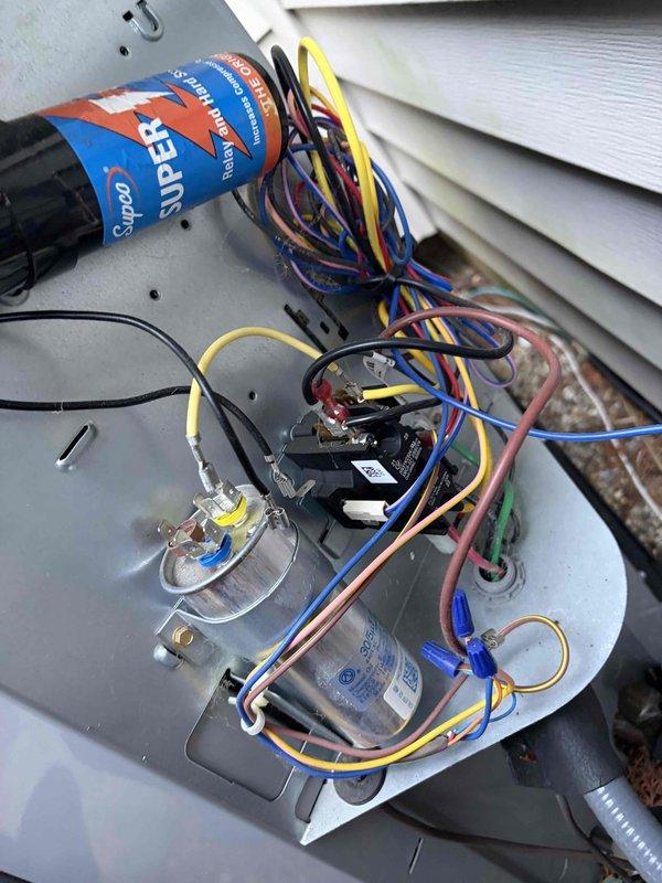 Completed prepaid cooling maintenance visit on residential HVAC system. Performed standard seasonal inspection including electrical testing with clamp meter, which showed normal amperage draw at 48.74 amps. Inspected condensing unit components, capacitor connections, contactor operation, and verified all electrical terminations were secure. System operating within manufacturer specifications.