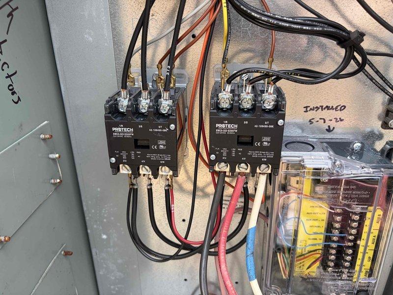 Replaced two 3-pole contactors in commercial HVAC electrical control panel. Verified proper wiring connections across all phases and tested system operation to ensure contactors engaged correctly under load.