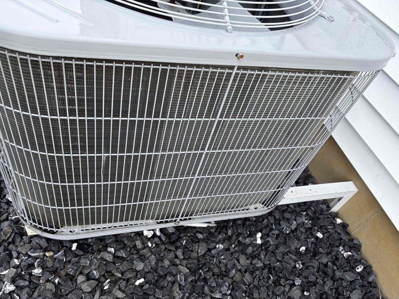 Completed prepaid cooling maintenance visit on residential air conditioning system. Performed standard inspection of outdoor condenser unit and internal components, documenting equipment condition with photos. System operational with no immediate repairs required at time of service.