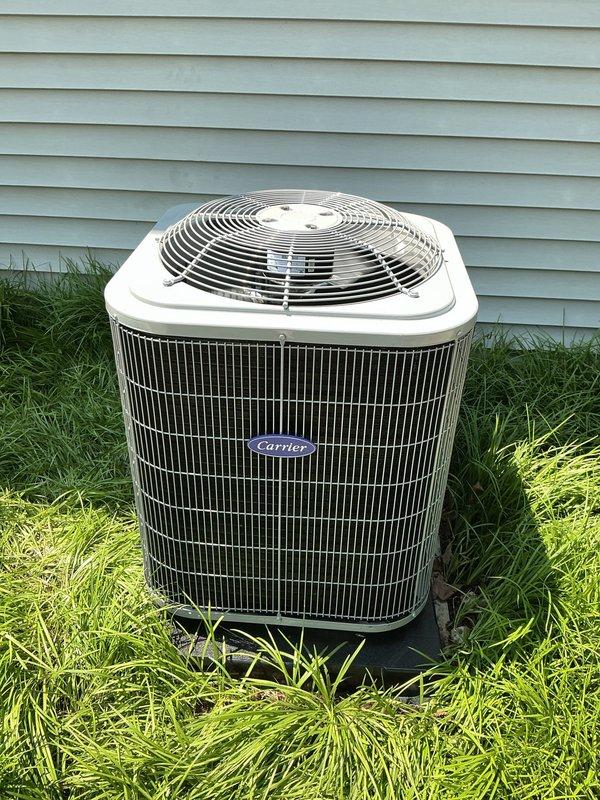 Completed full HVAC system installation including Carrier 26SCA424N003 outdoor condensing unit, CVAVA3014XMA air handler, and 58SB0B045M14-12 gas furnace. Positioned exterior condenser unit on concrete pad adjacent to structure with proper clearances maintained. Installed Honeywell Home FocusPRO S200 WiFi-enabled programmable thermostat (model TH2320WF4010) for system control. All equipment commissioned, tested for proper operation, and system verified to be heating and cooling effectively.