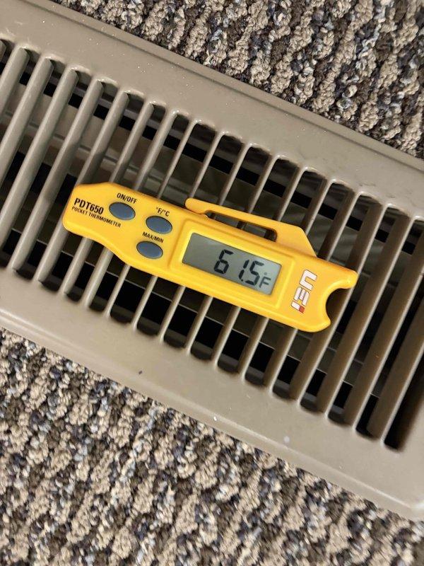 Completed final prepaid cooling maintenance visit for commercial facility. Performed system diagnostics and measured supply air temperature at floor register, recording 61.5°F, confirming proper cooling operation and adequate airflow delivery.