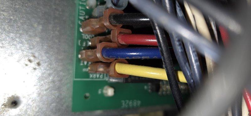 Responded to no cooling call on 10+ year old unit. Upon arrival, system was operational after being cycled off overnight due to intermittent failure to start. Performed diagnostic inspection of control board and electrical connections, documented wiring terminations and circuit board condition with photos. Unit running normally at time of service, advised monitoring for recurring issues given age of equipment and intermittent nature of the failure.