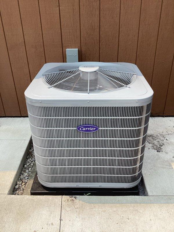 Completed full HVAC system replacement including installation of Carrier 26TPA836W003 two-stage air conditioner, Carrier CVAVA4217XMA evaporator coil, and Carrier 58TP0B070V17-16 two-stage non-condensing gas furnace with Honeywell ELITEPRO S1200 thermostat. Removed and recycled existing equipment, reconnected to existing line set with complete flush and pressure testing, installed new disconnect and whip, and secured all necessary permits. Post-installation diagnostics confirmed proper refrigerant pressures and system operation with senior technician quality assurance walkthrough completed.