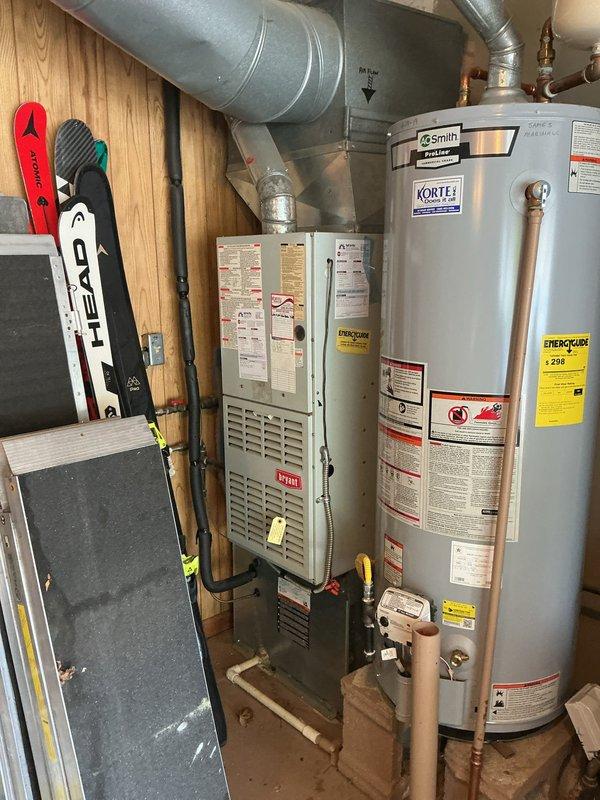Completed comprehensive on-site assessment for full HVAC system replacement, evaluating existing outdoor air conditioning condenser unit and indoor Bryant furnace installation. Documented current equipment conditions, measurements, and specifications to provide accurate replacement estimate for both heating and cooling systems.