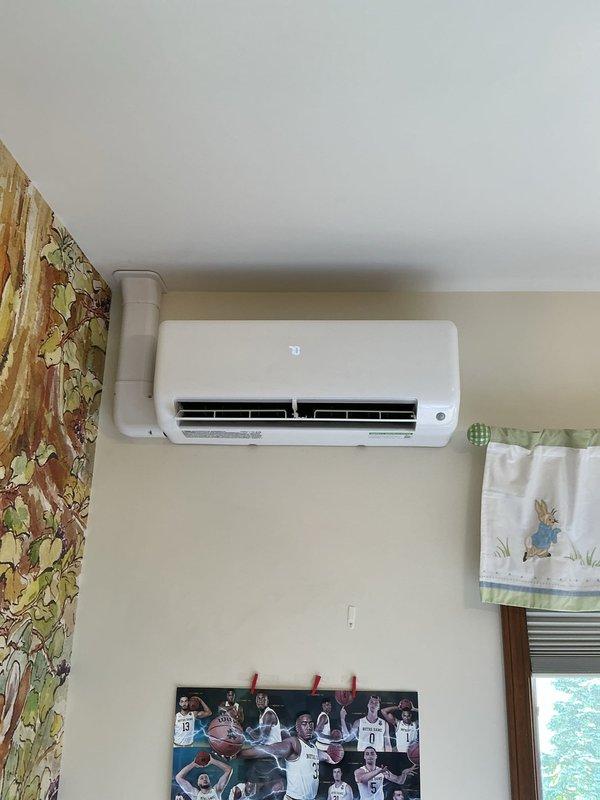 Successfully installed a complete two-head Carrier ductless mini-split heat pump system consisting of one CE37MRAQ18CA3 18,000 BTU outdoor unit with R454B refrigerant, one CED5MAHAQ09XA3 9,000 BTU indoor wall-mounted head, and one CED5MAHAQ12XA3 12,000 BTU indoor wall-mounted head. Mounted both indoor units on interior walls in residential living spaces, ran refrigerant line sets and control wiring between indoor and outdoor units, and installed PVC condensate drain lines for proper moisture removal. Set outdoor unit on PVC pad with risers, completed all electrical connections, performed system startup procedures, and verified proper operation of both zones.