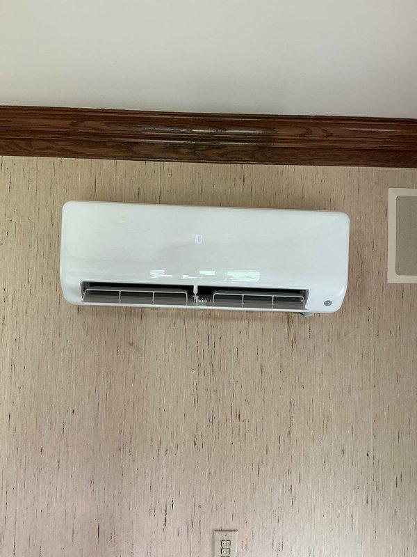 Successfully installed a complete two-head Carrier ductless mini-split heat pump system consisting of one CE37MRAQ18CA3 18,000 BTU outdoor unit with R454B refrigerant, one CED5MAHAQ09XA3 9,000 BTU indoor wall-mounted head, and one CED5MAHAQ12XA3 12,000 BTU indoor wall-mounted head. Mounted both indoor units on interior walls in residential living spaces, ran refrigerant line sets and control wiring between indoor and outdoor units, and installed PVC condensate drain lines for proper moisture removal. Set outdoor unit on PVC pad with risers, completed all electrical connections, performed system startup procedures, and verified proper operation of both zones.