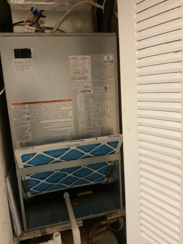 Successfully completed full HVAC system installation including a Carrier 2.0-ton, 15 SEER heat pump with R454B refrigerant and matching wall-mount air handler equipped with 8kW electric heaters. Reconnected system to existing supply air ductwork and refrigerant lines after flushing and pressure testing to ensure proper operation. Installed Honeywell T-6 digital thermostat and reconnected all high and low voltage wiring, verified electrical connections, and properly labeled heat pump unit per code requirements.