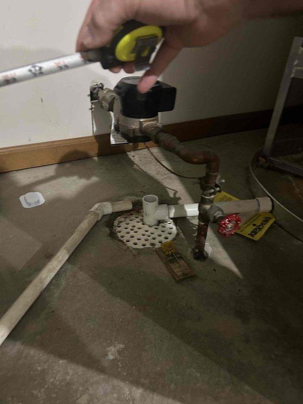 Responded to no cooling complaint and performed comprehensive assessment of existing HVAC system. Documented current equipment configuration including air handler unit and associated plumbing connections. Measured and photographed existing installation to provide accurate replacement estimate. System evaluation confirmed air conditioning component requires replacement while existing furnace remains operational per occupant feedback. Prepared detailed documentation including equipment specifications, clearance measurements, and existing utility connections for replacement proposal.