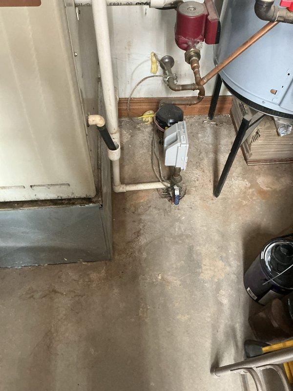 Conducted on-site evaluation for gas furnace and air conditioning system replacement. Assessed existing Energyfit furnace installation and measured current equipment dimensions to determine proper sizing requirements for new HVAC system. Documented existing plumbing connections, PVC condensate drainage configuration, and utility room layout to prepare comprehensive replacement estimate for complete heating and cooling system upgrade.