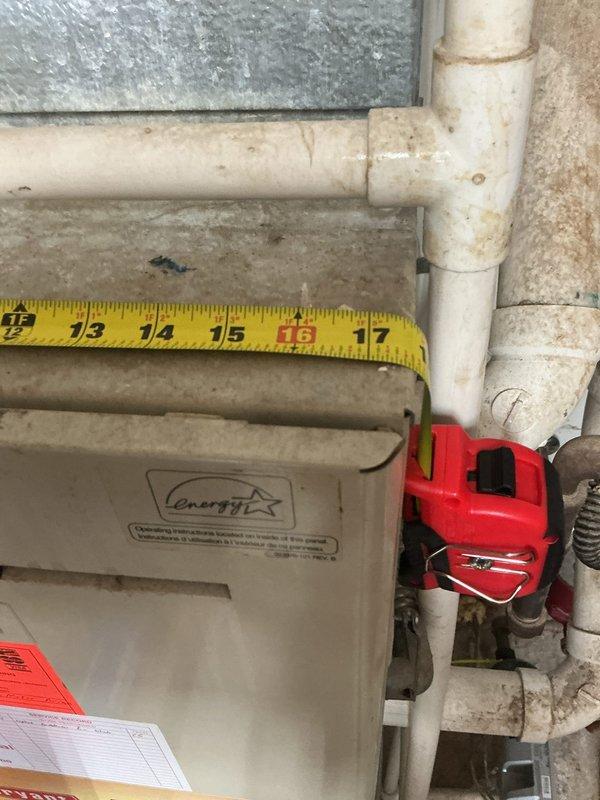 Conducted on-site evaluation for gas furnace and air conditioning system replacement. Assessed existing Energyfit furnace installation and measured current equipment dimensions to determine proper sizing requirements for new HVAC system. Documented existing plumbing connections, PVC condensate drainage configuration, and utility room layout to prepare comprehensive replacement estimate for complete heating and cooling system upgrade.