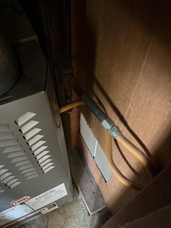 Replaced flexible gas line with rigid black pipe at furnace connection to meet code requirements identified during home inspection. Inspected and assessed dryer vent system for proper installation and compliance. All work completed in accordance with current safety standards and building codes for residential gas appliance installations.