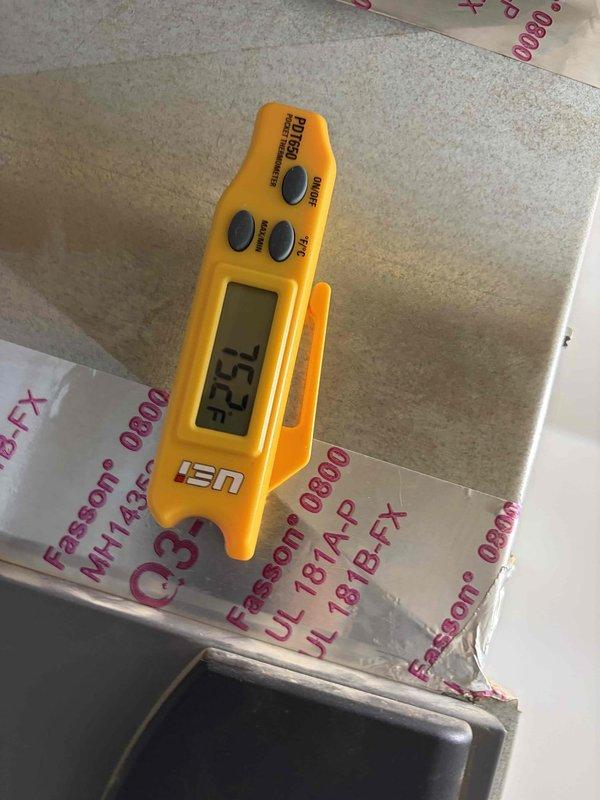 Performed standard cooling season tune-up on residential air conditioning system. Conducted comprehensive system inspection including temperature differential measurements, verifying supply air temperature at floor register reading 50.6°F and return air temperature at 82.9°F, indicating proper system operation with approximately 32°F temperature split. All components operating within normal parameters.