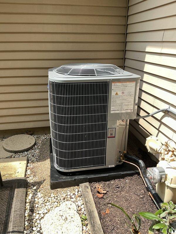 Completed full HVAC system installation including outdoor condensing unit model 26SCA442N003 positioned on gravel pad with proper drainage and clearances against exterior wall. Installed indoor air handler unit model CVAVA4821XMA with refrigerant line set connections, ensuring proper insulation and routing of copper lines. Upgraded thermostat to Honeywell Home ElitePRO S1200 Smart Thermostat with IAQ control compatibility, programmed for optimal system operation and connected to HVAC equipment. Verified all electrical connections, tested system startup and operation, confirmed proper airflow and refrigerant charge levels, and ensured all safety controls functioning correctly.