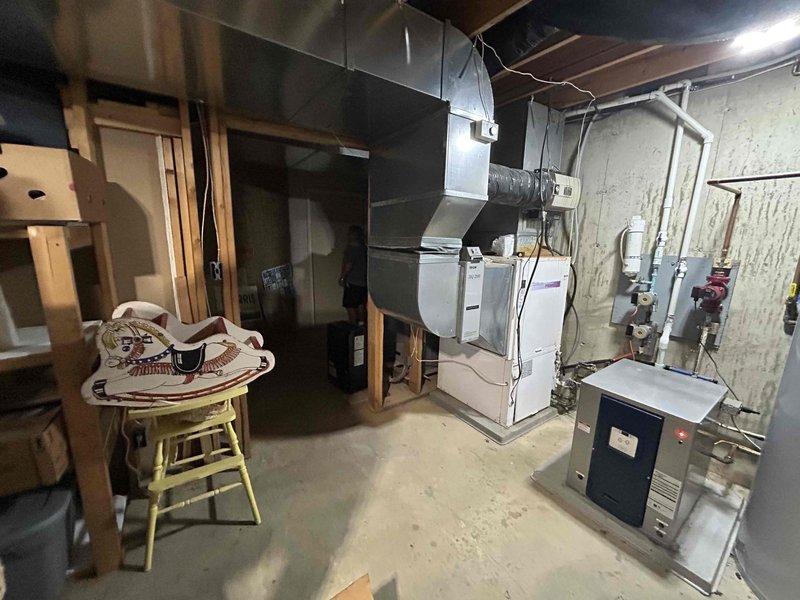 Conducted estimate for geothermal system conversion from existing open loop configuration to closed ground loop system. Evaluated current basement-mounted geothermal equipment, including wall-mounted pipe connections and existing HVAC infrastructure. Assessed installation requirements for transitioning to closed loop ground source heat pump system while existing open loop unit remains operational.