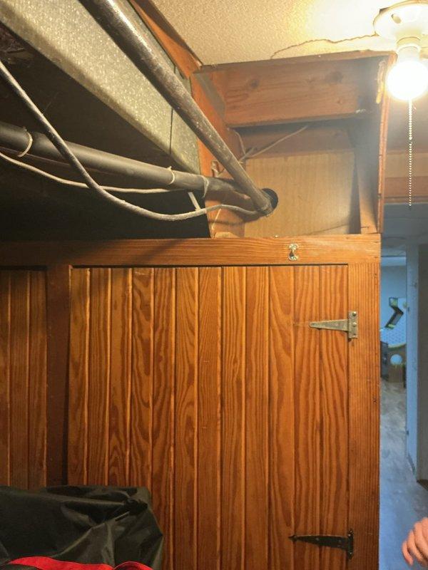 Responded to no cooling call and performed system evaluation. Assessed existing outdoor condenser unit and indoor furnace installation for replacement estimate. Documented current equipment conditions including outdoor AC unit with visible wear and indoor furnace cabinet assembly to provide comprehensive replacement options for both heating and cooling systems.
