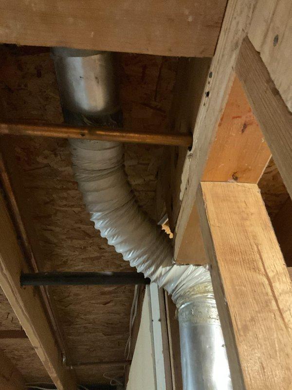 Installed a 50-gallon natural gas water heater with natural draft venting and expansion tank in response to existing unit failure and active leak. Utilized existing piping infrastructure to connect new water heater system, ensuring proper integration with home's plumbing. Repaired dryer vent routing during installation to ensure proper ventilation and code compliance.