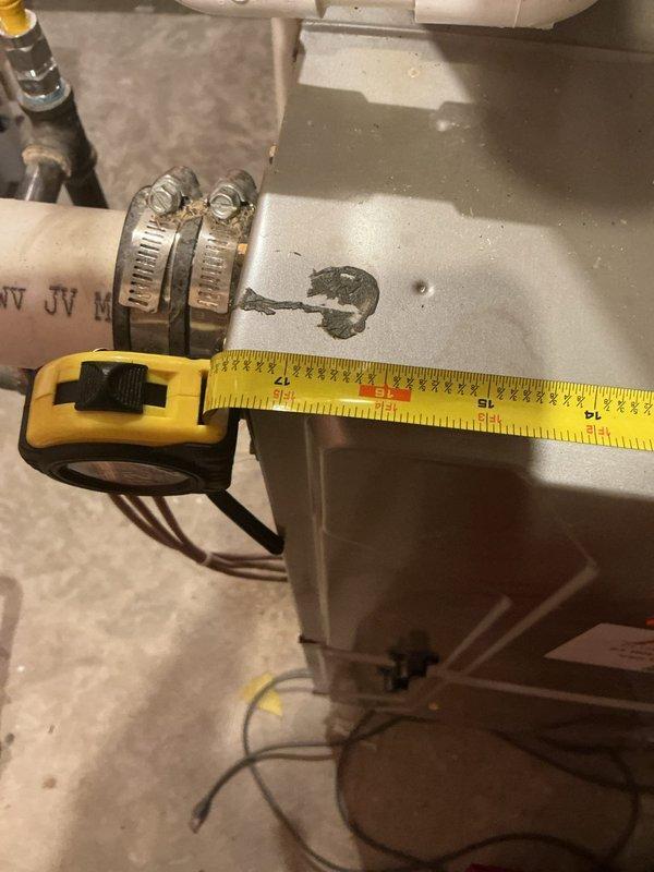 Completed on-site assessment for residential air conditioning system replacement. Evaluated existing Bryant furnace and current HVAC infrastructure in basement utility area, including ductwork configuration, condensate drain lines, and available clearances for new equipment installation. Documented equipment dimensions and existing PVC piping layout to determine compatibility requirements for replacement AC unit. Customer previously received repair estimate from another contractor but opted for full system replacement evaluation instead.