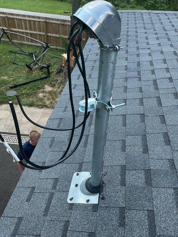 Responded to emergency service call for damaged overhead electrical service caused by fallen tree. Removed and replaced damaged weatherhead riser assembly and installed new meter base to restore safe electrical service to residence. All work completed to current NEC standards with proper weatherproofing and secure mounting hardware.