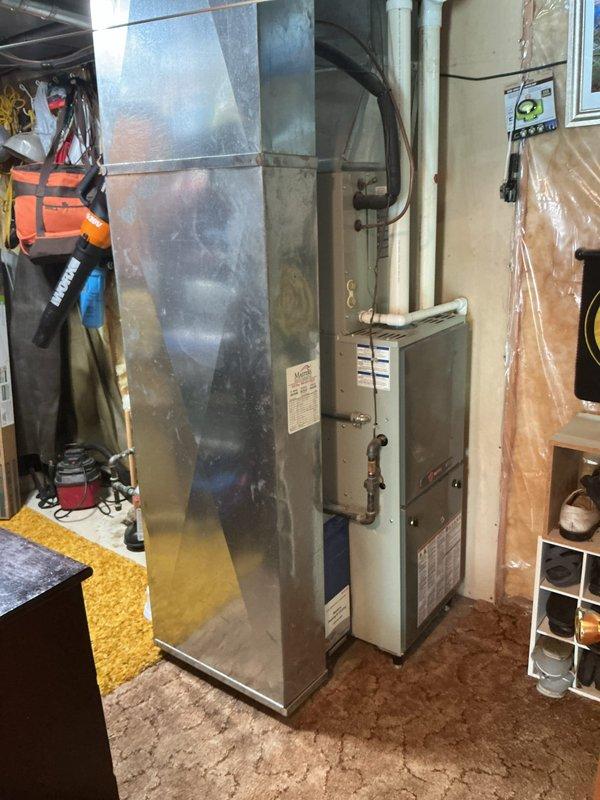 Completed annual cooling system maintenance on Trane condensing unit and associated indoor equipment. Performed comprehensive inspection of outdoor unit including cleaning of condenser coils, verification of refrigerant charge, testing of fan motor operation, and examination of electrical connections. Inspected indoor furnace and ductwork system in basement mechanical room, checked airflow, verified proper condensate drainage, and ensured all system controls were functioning correctly. Unit operating within manufacturer specifications upon completion of maintenance service.