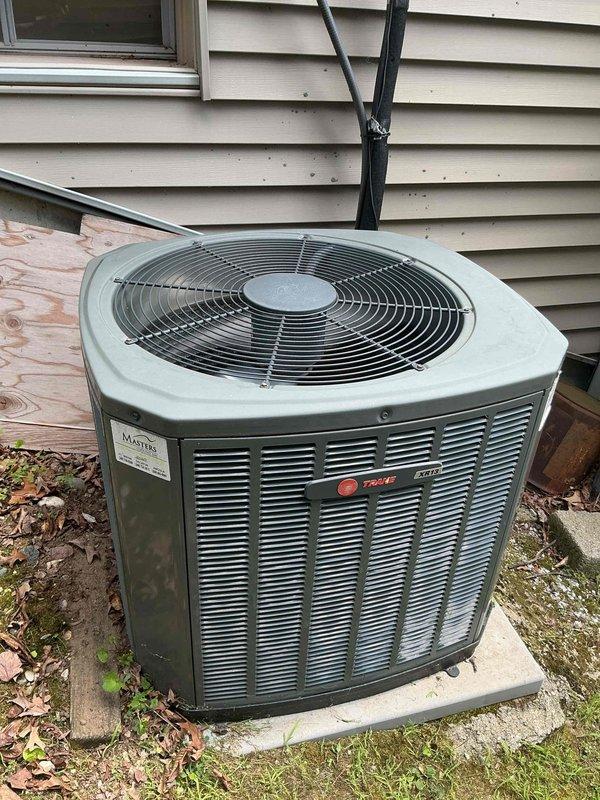 Completed annual cooling system maintenance on Trane condensing unit and associated indoor equipment. Performed comprehensive inspection of outdoor unit including cleaning of condenser coils, verification of refrigerant charge, testing of fan motor operation, and examination of electrical connections. Inspected indoor furnace and ductwork system in basement mechanical room, checked airflow, verified proper condensate drainage, and ensured all system controls were functioning correctly. Unit operating within manufacturer specifications upon completion of maintenance service.