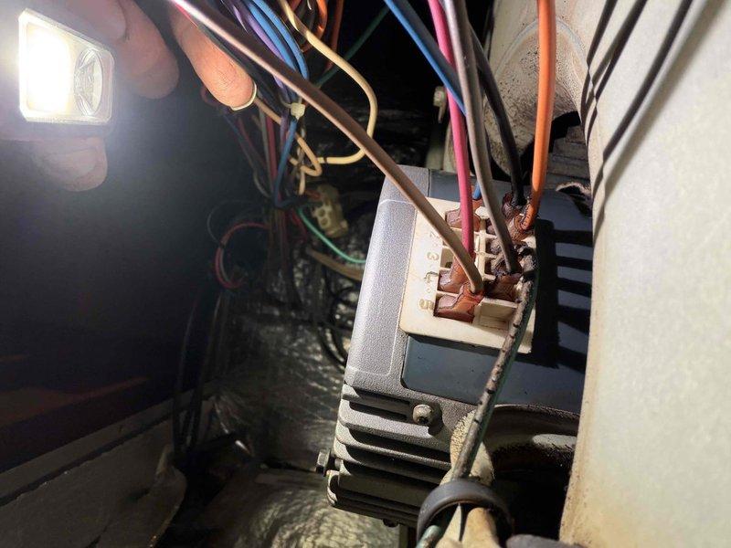 Responded to callback for system that stopped cooling after previous day's repair. Upon arrival, diagnosed faulty blower motor with intermittent dead spot as previously suspected. Inspected Interlink X13 1/2HP blower motor and confirmed motor failure causing system shutdown. Examined electrical connections at terminal block and verified wiring integrity. System restored to proper cooling operation.