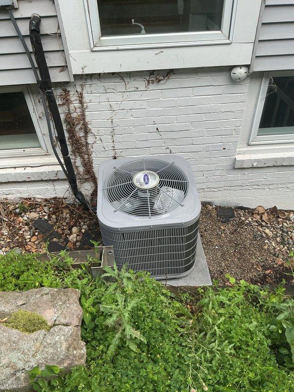 Performed preventive maintenance and cleaning on two residential air conditioning systems. The first unit, a Trane XL15i condensing unit, was inspected and serviced at its location on the side of the residence. The second AC unit was similarly maintained at its exterior position. Both systems received thorough cleaning of condenser coils, inspection of electrical connections, and verification of proper operation. All components were found to be functioning within normal parameters following the tune-up procedures.