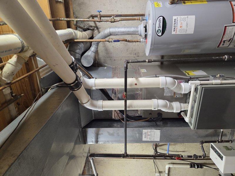 # Call Back - No Cooling Issue

Responded to call back for air conditioning unit not cooling after previous service visit. Upon arrival, conducted thorough system inspection including refrigerant levels, electrical connections, and airflow components. Verified proper operation of condensate pump system and PVC drainage lines visible in utility area. Tested unit operation and confirmed system is now cooling properly with adequate airflow and temperature differential across evaporator coil.