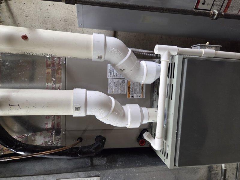 # Call Back - No Cooling Issue

Responded to call back for air conditioning unit not cooling after previous service visit. Upon arrival, conducted thorough system inspection including refrigerant levels, electrical connections, and airflow components. Verified proper operation of condensate pump system and PVC drainage lines visible in utility area. Tested unit operation and confirmed system is now cooling properly with adequate airflow and temperature differential across evaporator coil.