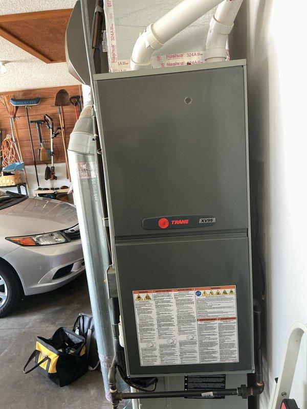 Completed preventive maintenance on residential cooling system. Inspected Trane XV95 furnace and associated HVAC components in garage installation, verified proper operation of all system controls, checked refrigerant levels, cleaned condensate drain lines, and inspected all electrical connections. Confirmed airflow through ductwork, tested thermostat functionality, and verified PVC venting system integrity. All components operating within manufacturer specifications at time of service completion.