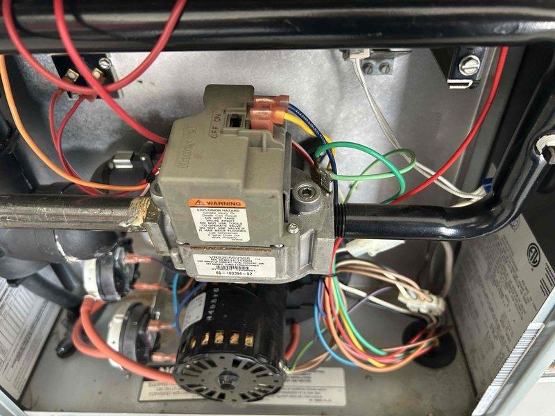 Completed comprehensive estimate for replacement of existing furnace and air conditioning system. Evaluated current operational but aging HVAC equipment, including interior furnace components with gas valve assembly and blower motor, as well as exterior condensing unit positioned on gravel pad against building exterior. Provided replacement options and pricing for complete system upgrade to improve efficiency and reliability.