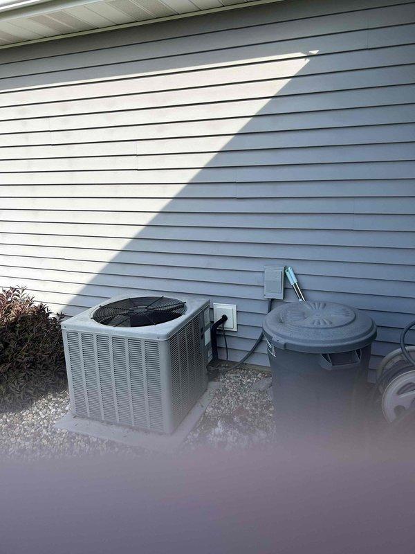 Completed comprehensive estimate for replacement of existing furnace and air conditioning system. Evaluated current operational but aging HVAC equipment, including interior furnace components with gas valve assembly and blower motor, as well as exterior condensing unit positioned on gravel pad against building exterior. Provided replacement options and pricing for complete system upgrade to improve efficiency and reliability.