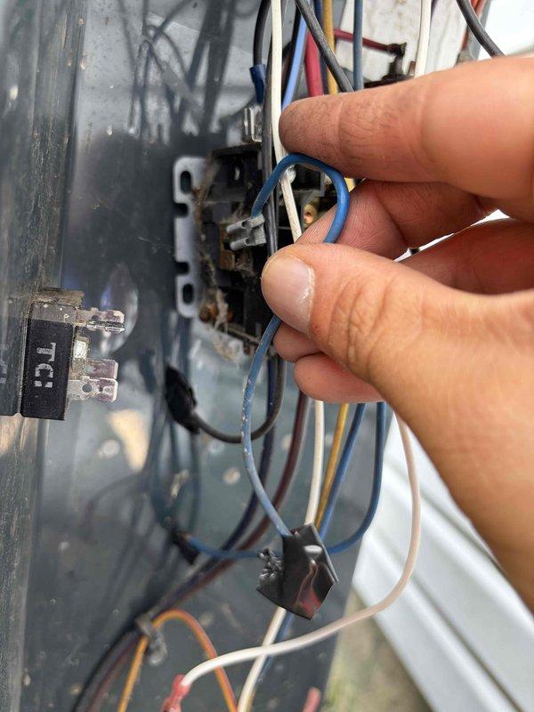 Responded to no cooling call on 11-year-old air conditioning system that had completely stopped operating. Upon inspection, found failed contactor with severely corroded contacts and terminals preventing compressor and condenser fan operation. Replaced defective contactor, secured all electrical connections with proper ring terminals, and verified system startup. Unit restored to normal cooling operation with all components functioning properly.