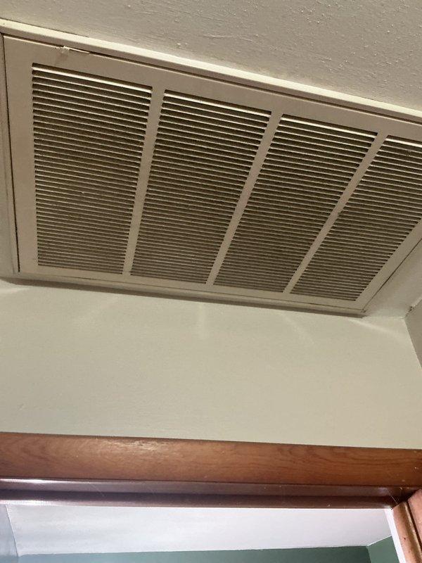 Conducted comprehensive assessment of residential air conditioning system experiencing no cooling condition. Evaluated outdoor condensing unit positioned on concrete pad adjacent to home exterior, inspecting compressor operation, refrigerant levels, and electrical connections. Examined indoor air return vent and distribution system for proper airflow and potential restrictions. Documented existing equipment condition including condenser coil, fan assembly, and associated electrical components. Provided detailed replacement estimate for complete AC system upgrade to restore cooling functionality and improve overall efficiency.