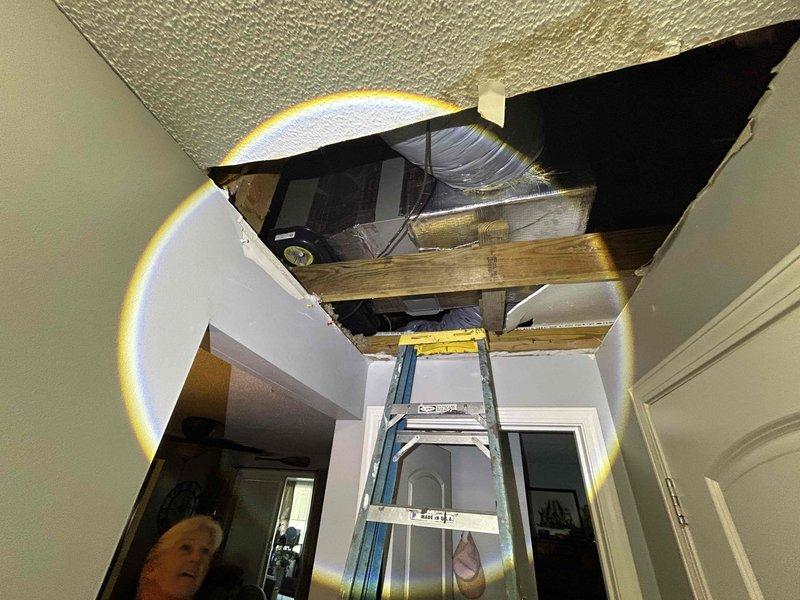 Conducted estimate for electric furnace replacement currently located in attic space, accessed through hallway ceiling opening. Assessed existing HVAC system configuration including ductwork and evaluated feasibility of relocating heating equipment from attic to main floor level to improve accessibility and serviceability. Provided multiple replacement options to address equipment failure and discussed relocation alternatives with family members.
