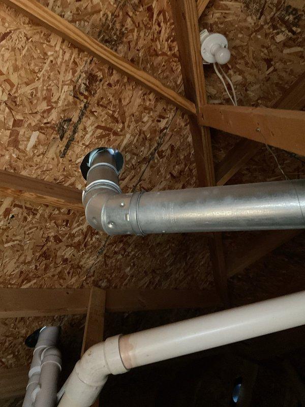 Performed preventive maintenance service on gas-fired tank-type water heater, including inspection of all components and connections. Investigated reported water intrusion occurring during rain events by examining water heater vent system in attic space, tracing vent piping through insulated areas and structural framing to determine if leak originated from interior penetration or above roof line. Customer enrolled in preventive maintenance program for ongoing system care.